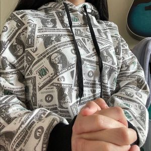 A money cropped hoodie with a hood